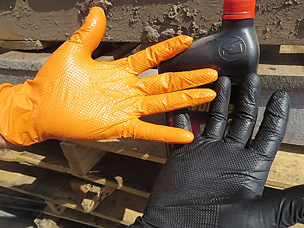 Orange and Black Guard Nitrile Gloves Handling Oil